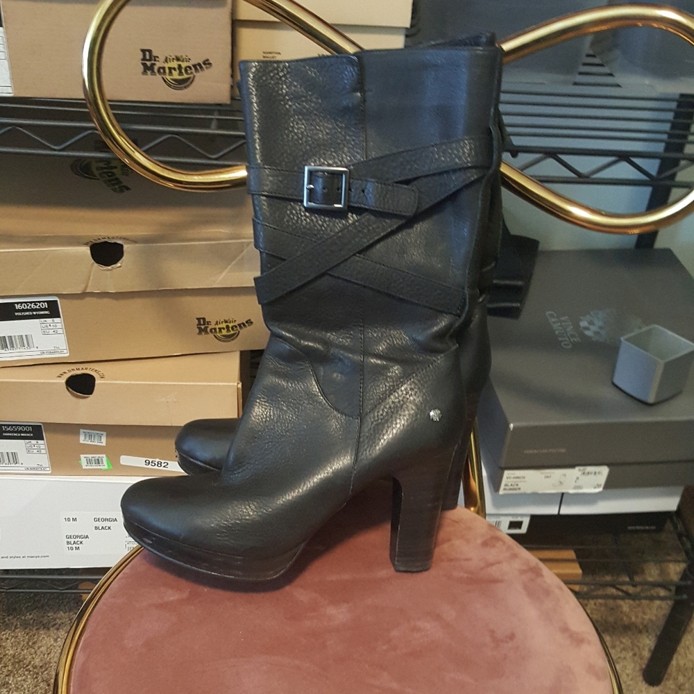 Mid calf leather boots.